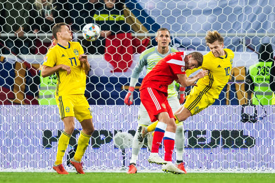 Viktor Claesson, goalkeeper Robin Olsen and Emil Forsberg