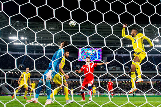 Marcus Berg and Isaac Kiese Thelin of Sweden against