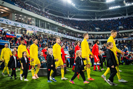 Players of Sweden enters the pitch