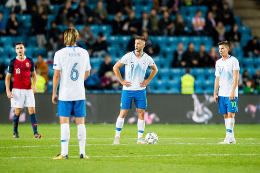 Andraz Sporar and Miha Zajc of Slovenia look dejected