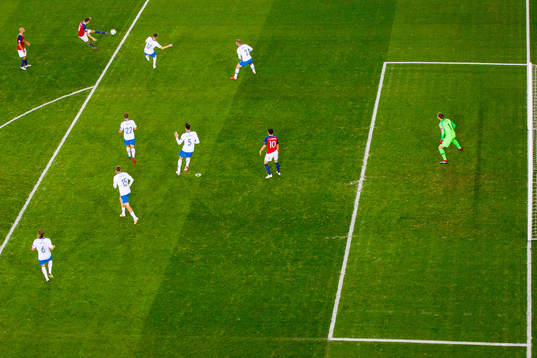 Ole Kristian Selnæs of Norway scores 1-0 behind goalkeeper