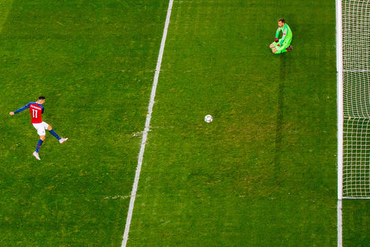 Mohamed Elyounoussi of Norway celebrates while goalkeeper