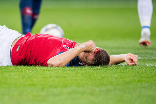 Markus Henriksen of Norway with an injury
