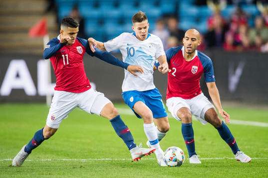 Mohamed Elyounoussi of Norway, Miha Zajc of Slovenia and