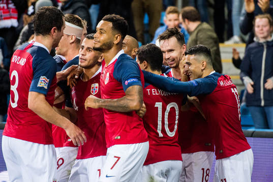 Ole Kristian Selnæs of Norway celebrates with teammates