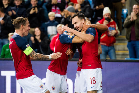Ole Kristian Selnæs of Norway celebrates with teammates