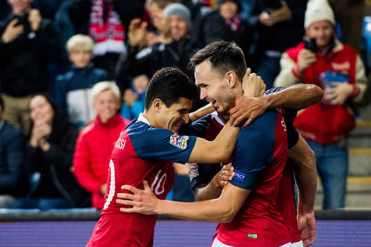 Ole Kristian Selnæs of Norway celebrates with teammates