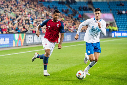 Joshua King of Norway and Nemanja Mitrovic of Slovenia