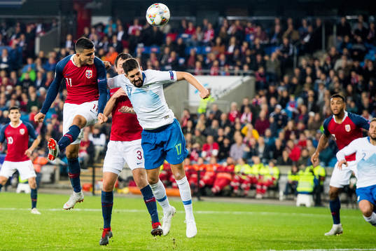 Mohamed Elyounoussi of Norway and Miha Mevlja of Slovenia