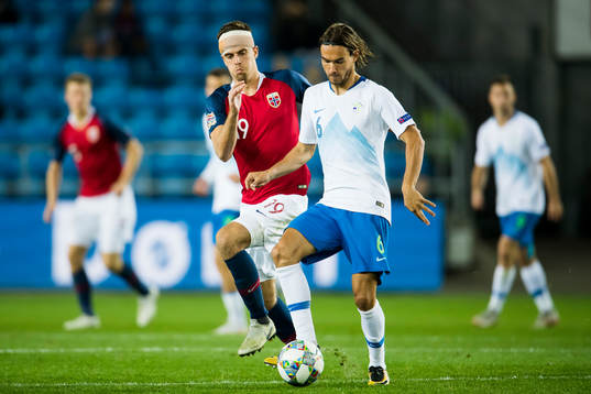 Markus Henriksen of Norway and René Krhin of Slovenia