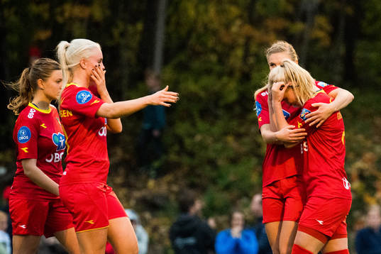 The players of Røa look dejected