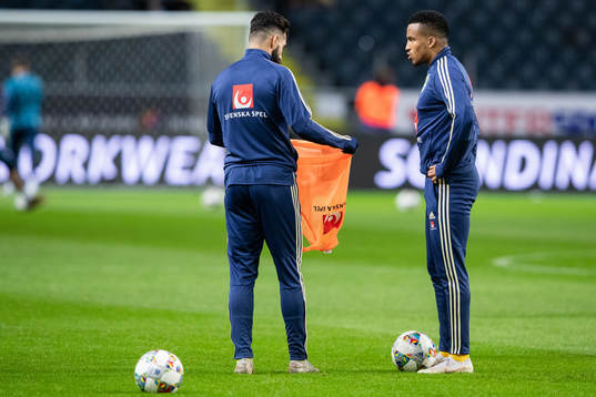 Jimmy Durmaz and Martin Olsson of Sweden  warms up