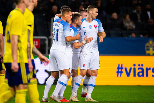 Albert Rusnak of Slovakia celebrates with teammates