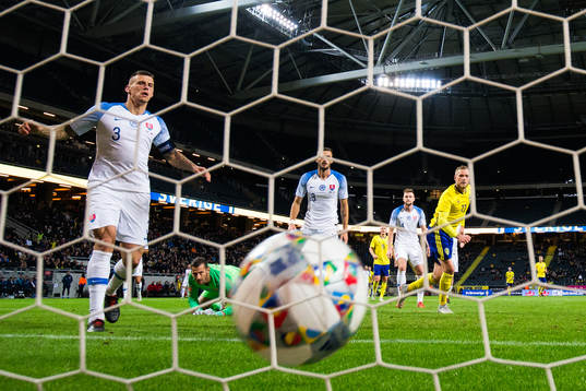 Martin Skrtel and goalkeeper Martin Dubravka looks dejected