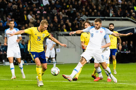 Oscar Hiljemark of Sweden and Erik Sabo of Slovakia