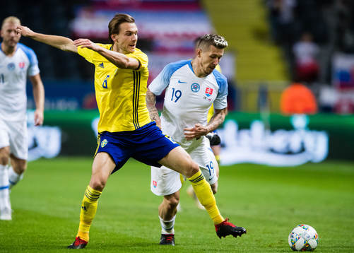 Albin Ekdal of Sweden and Juraj Kucka of Slovakia