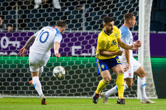 Albert Rusnak of Slovakia scores 1-1 past Sotirios