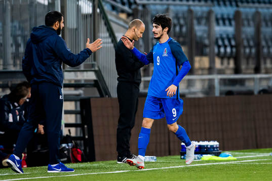 Fahmin Muradbayli of Azerbaijancelebrates with Rashad