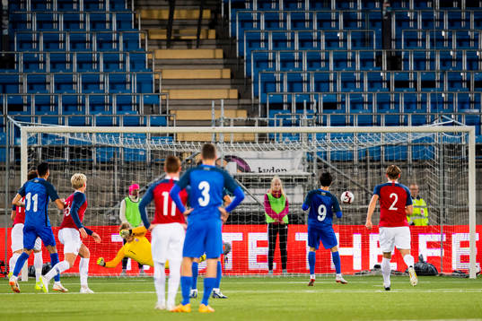 Fahmin Muradbayli of Azerbaijan scores 0-1 an a penalty