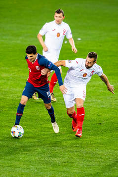 Tarik Elyounoussi of Norway and Nikolay Bodurov of Bulgaria