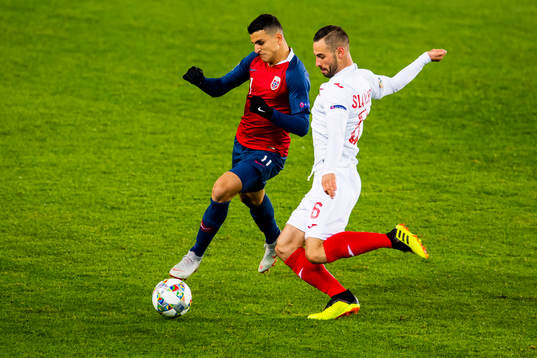 Mohamed Elyounoussi of Norway and Simeon Slavchev of