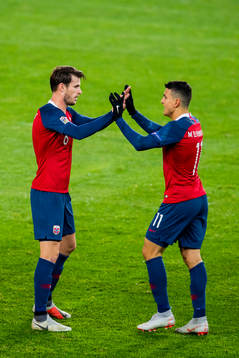 Mohamed Elyounoussi of Norway celebrates with his teammate