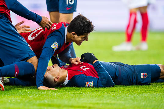 Mohamed Elyounoussi of Norway celebrates with teammate