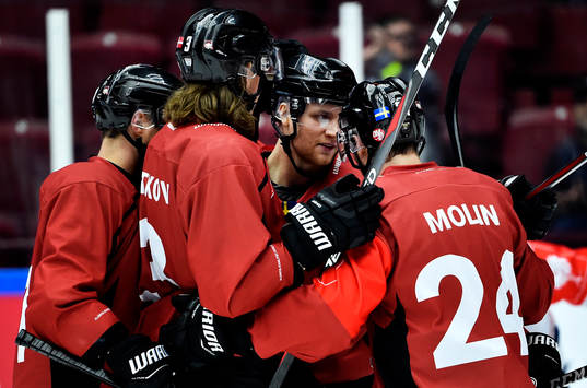 Max Görtz of Malmö Redhawks scores a goal and celebrates