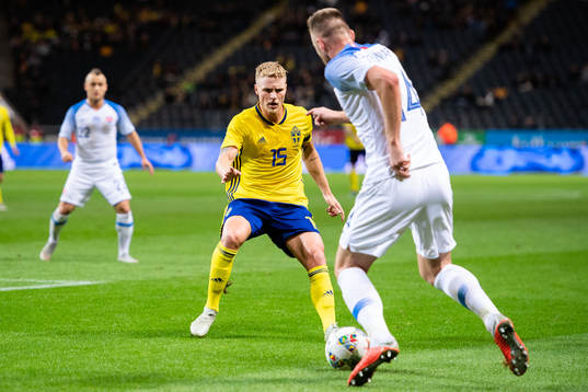 Oscar Hiljemark of Sweden and Milan Skriniar of Slovakia