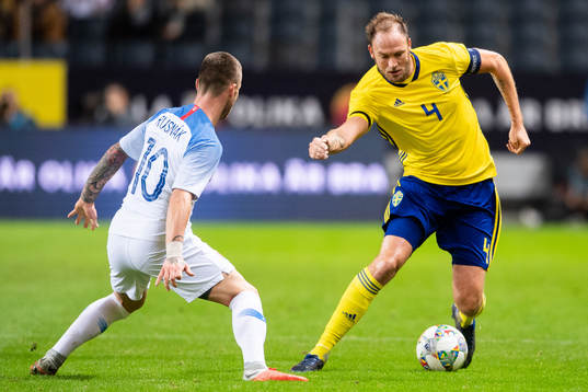 Albert Rusnak of Slovakiaand Andreas Granqvist of Sweden