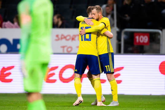 Emil Krafth and John Guidetti of Sweden celebrates