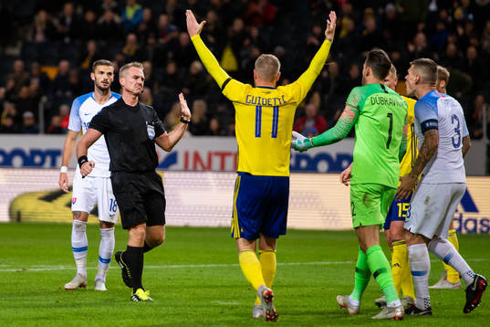 Goalkeeper Martin Dubravka of Slovakia reacts against the