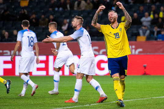 Pontus Jansson of Sweden looks dejected