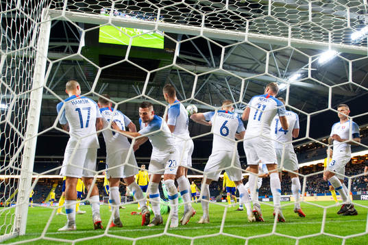 The players of Slovakia defend the goal