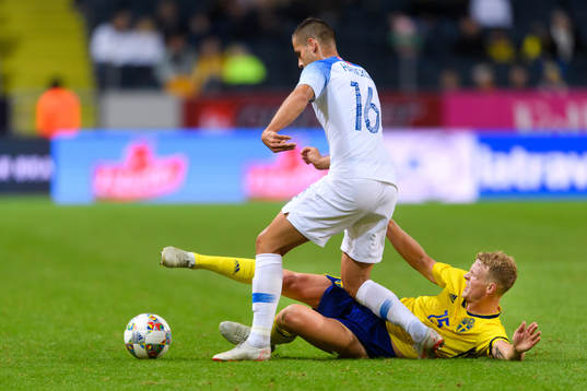 David Hancko of Slovakia and Oscar Hiljemark of Sweden