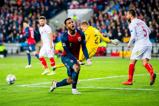 Joshua King of Norway looks dejected