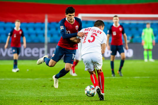 Tarik Elyounoussi of Norway and Vasil Bozhikov of Bulgaria