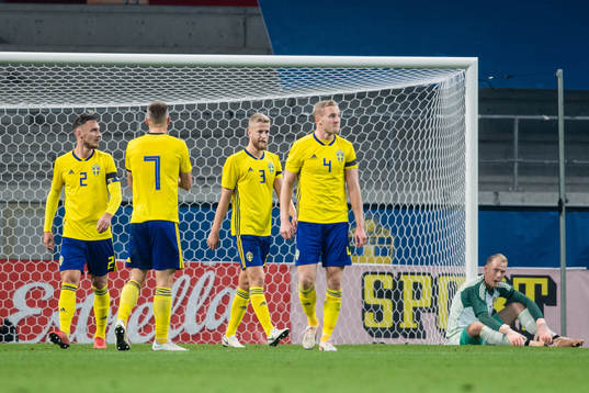 Players of Sweden  looks dejected