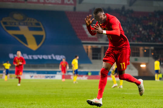 Dodi Lukabakio of Belgium celebrates