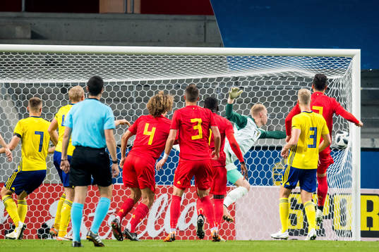 Nany Dimata of Belgium scores the 0-1 goal behind