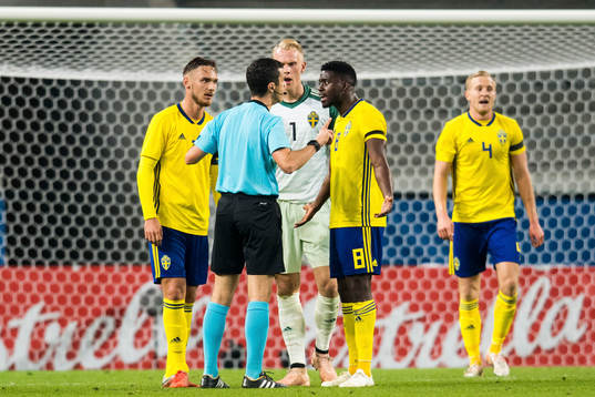 Linus Wahlqvist, goalkeeper Pontus Dahlberg and Isak