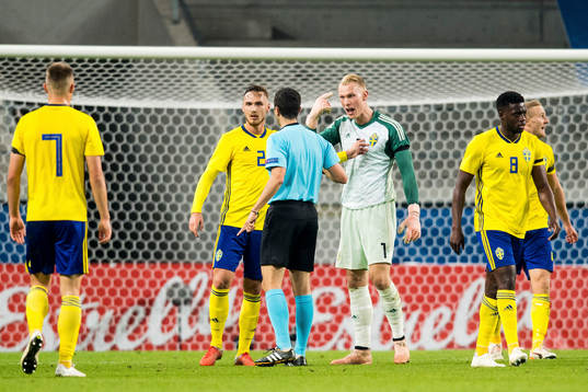 Linus Wahlqvist, goalkeeper Pontus Dahlberg and Isak