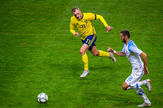 John Guidetti of Sweden and Erik Sabo of Slovakia