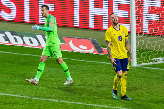 Pontus Jansson of Sweden looks dejected