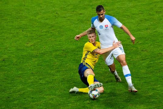 Oscar Hiljemark of Sweden and David Hancko of Slovakia