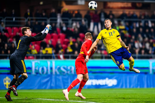 Jordan Larsson of Sweden and goalkeeper Ortwin De Wolf of