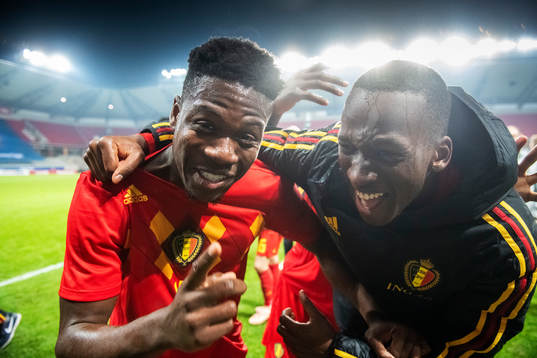 Aaron Leya Iseka and Nany Dimata of Belgium celebrates