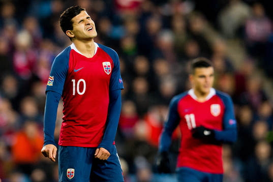 Tarik Elyounoussi of Norway looks dejected
