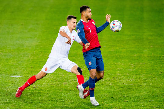 Georgi Kostadinov of Bulgaria and Joshua King of Norway