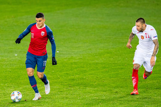 Mohamed Elyounoussi of Norway and Ivan Bandalovski of